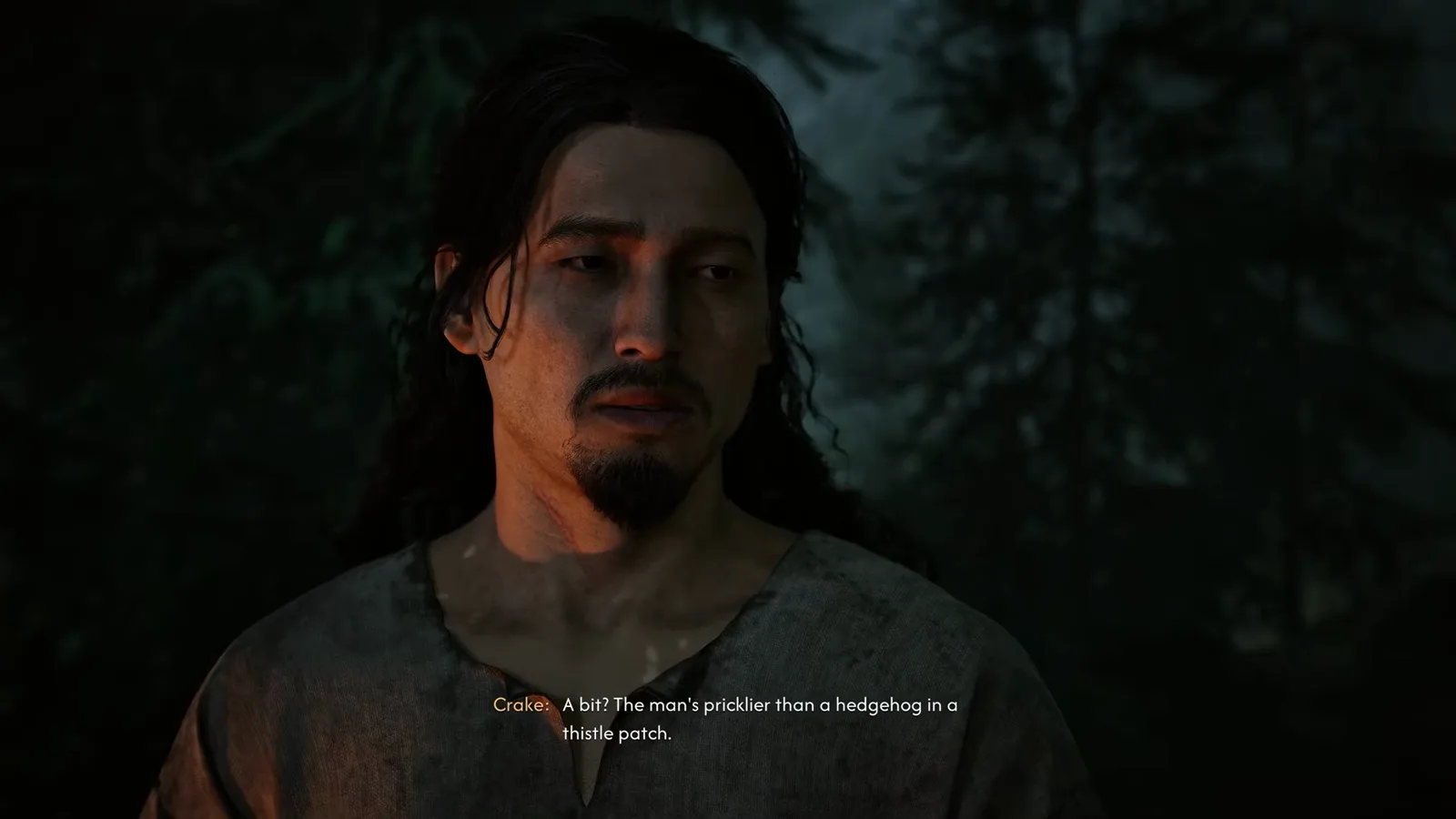 Crake, the bearded leader of the Manumit rebellion, talking by night in a forest during his companion questline in The Blood of Dawnwalker