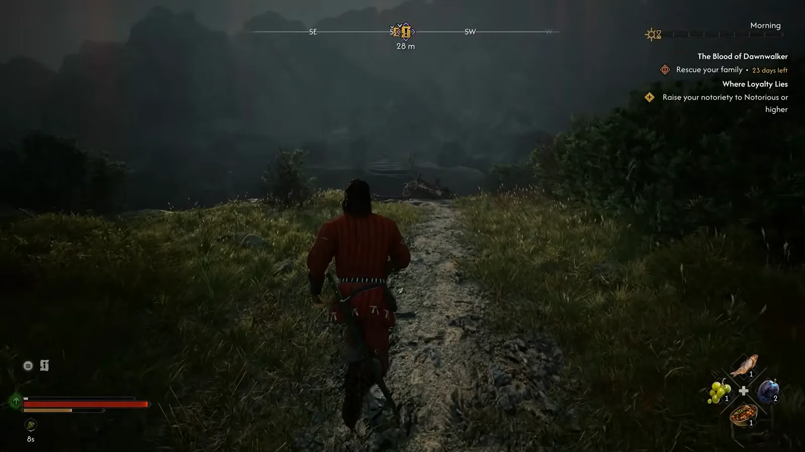 The protagonist running down a grassy ridge toward The Cursed Chasm in The Blood of Dawnwalker, with the compass quest marker 28 metres ahead and the 'Rescue your family' tracker reading 23 days left