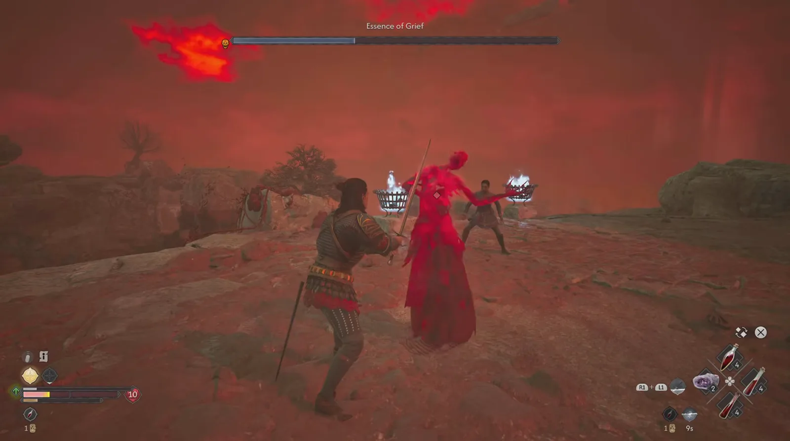 A red fireball streaking across the sky behind the Essence of Grief while she extends one arm toward Coen in the red memory arena