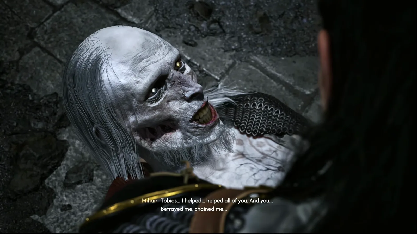 The Blood of Dawnwalker cutscene of defeated Mihai lying on the crypt floor with the subtitle Tobias I helped helped all of you and you betrayed me chained me