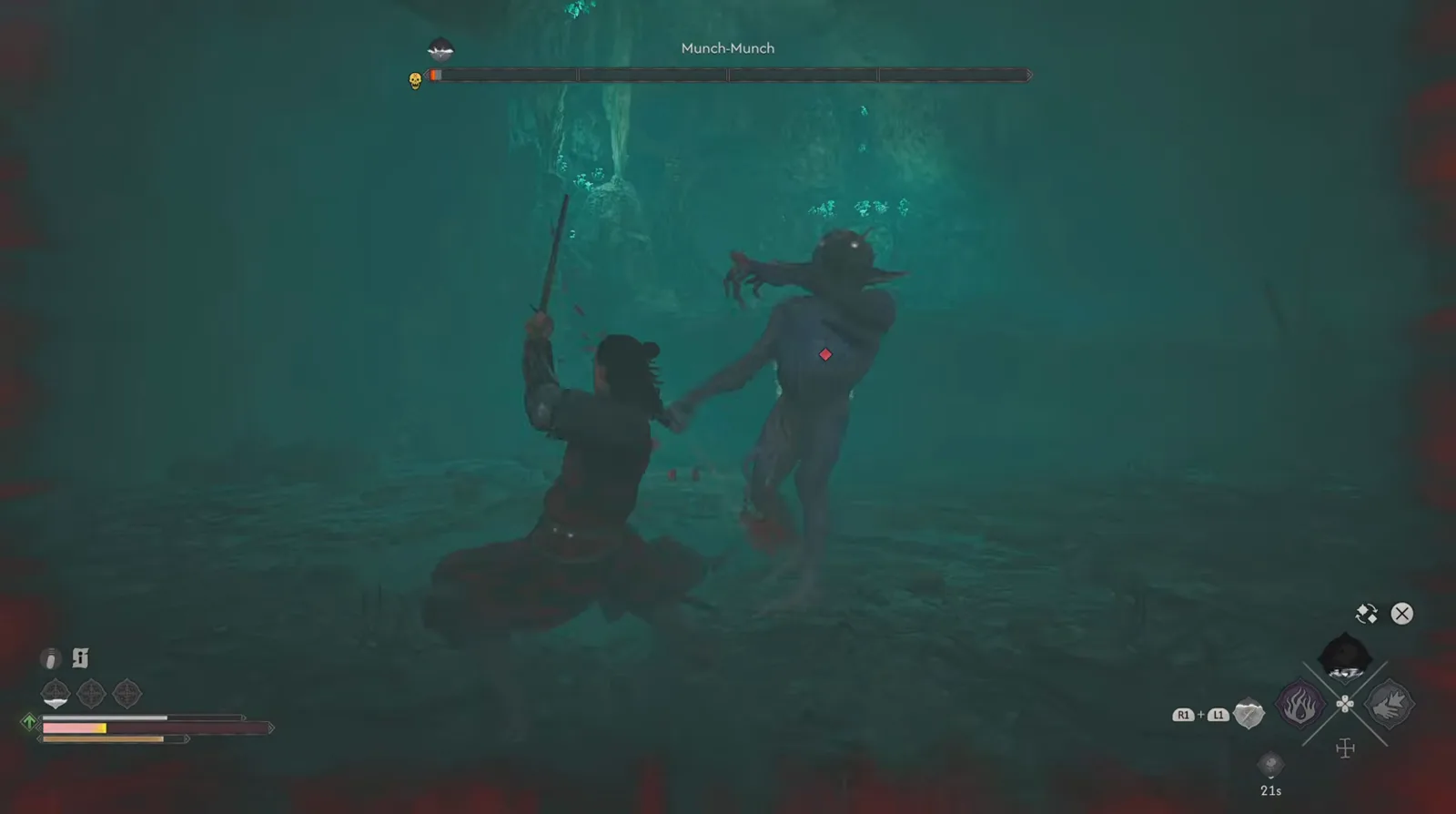 A red damage vignette closing in around the screen edges in The Blood of Dawnwalker as Coen swings at the lunging Munch-Munch with his own health bar nearly empty
